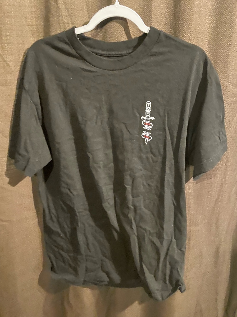 Last call Black Men's Graphic Tee with Small Dagger Design